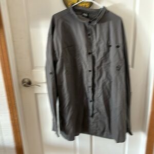 This shirt is a long-sleeved, grey-colored garment. 4xl